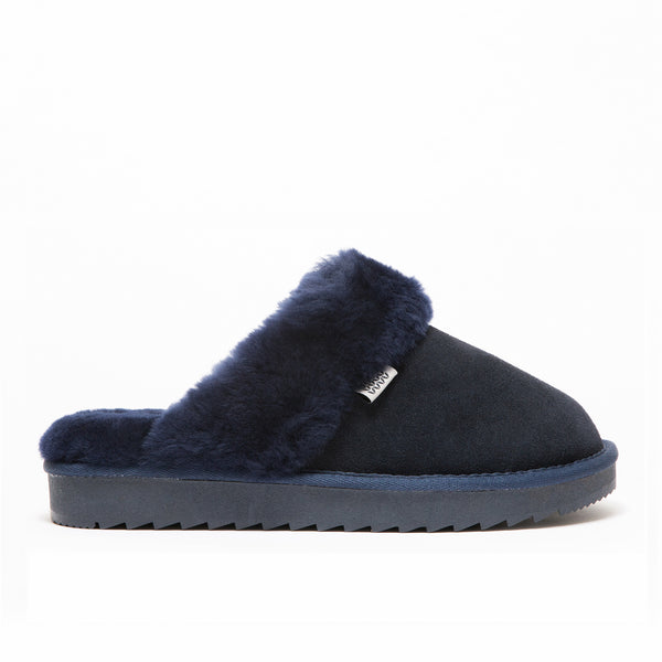 supasnug luxury mule slipper in navy pure sheepskin with a heavy cleated sole for durability 
