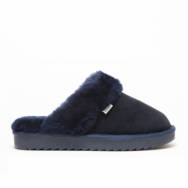 supasnug luxury mule slipper in navy pure sheepskin with a heavy cleated sole for durability 